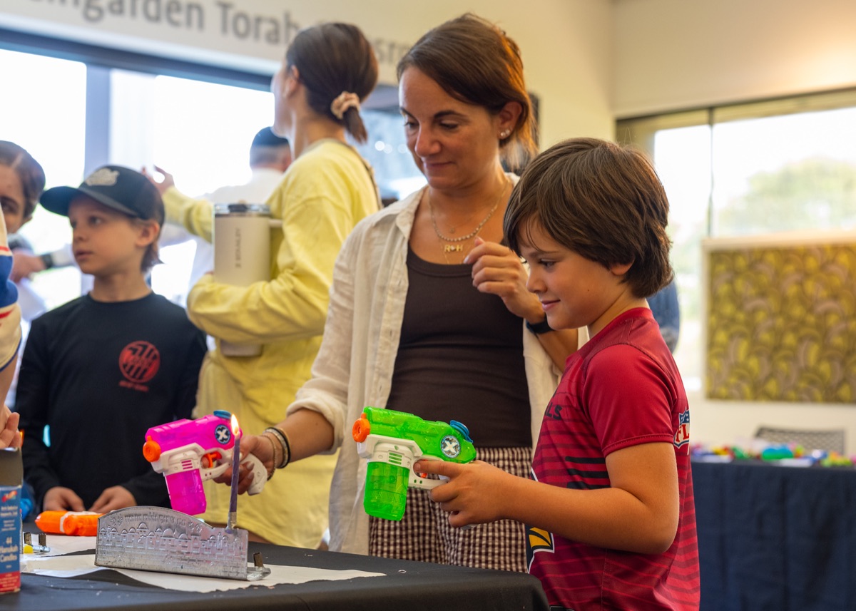A parent and son at a Sunday School celebration